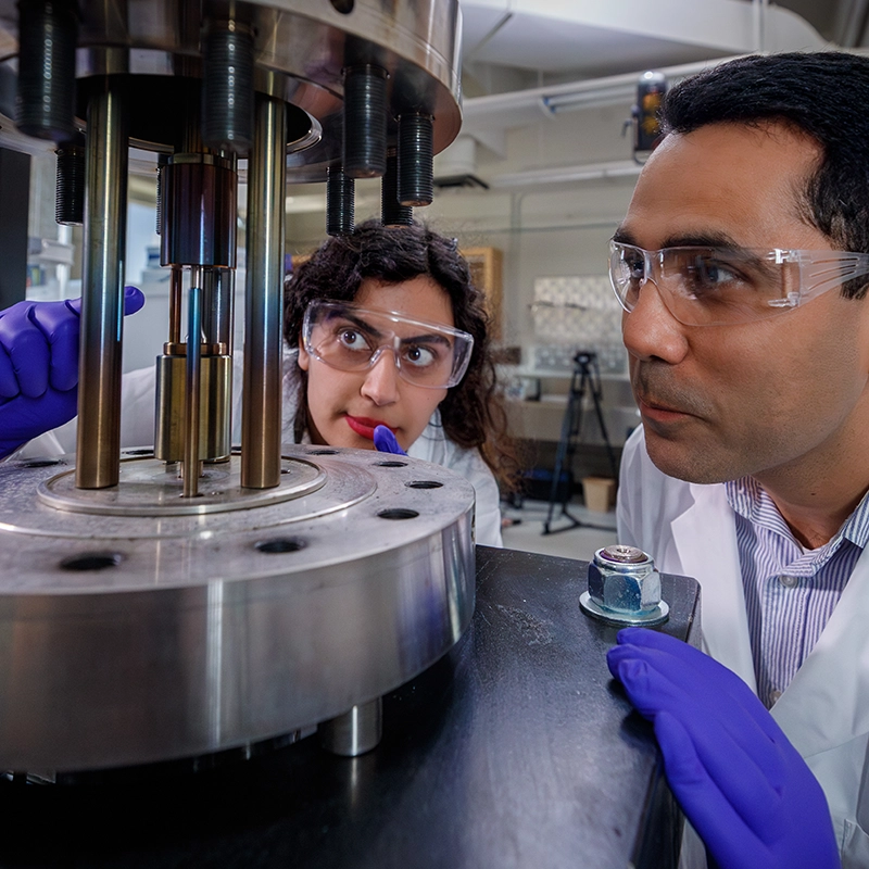 Hamid Abdolvand and research team looking at nuclear rods