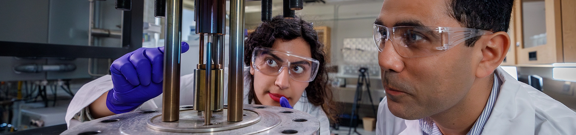 Hamid Abdolvand and research team looking at nuclear rods