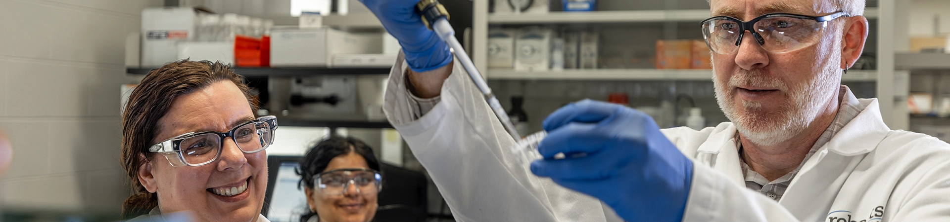 Researchers work in a lab in at Robarts Research Institute